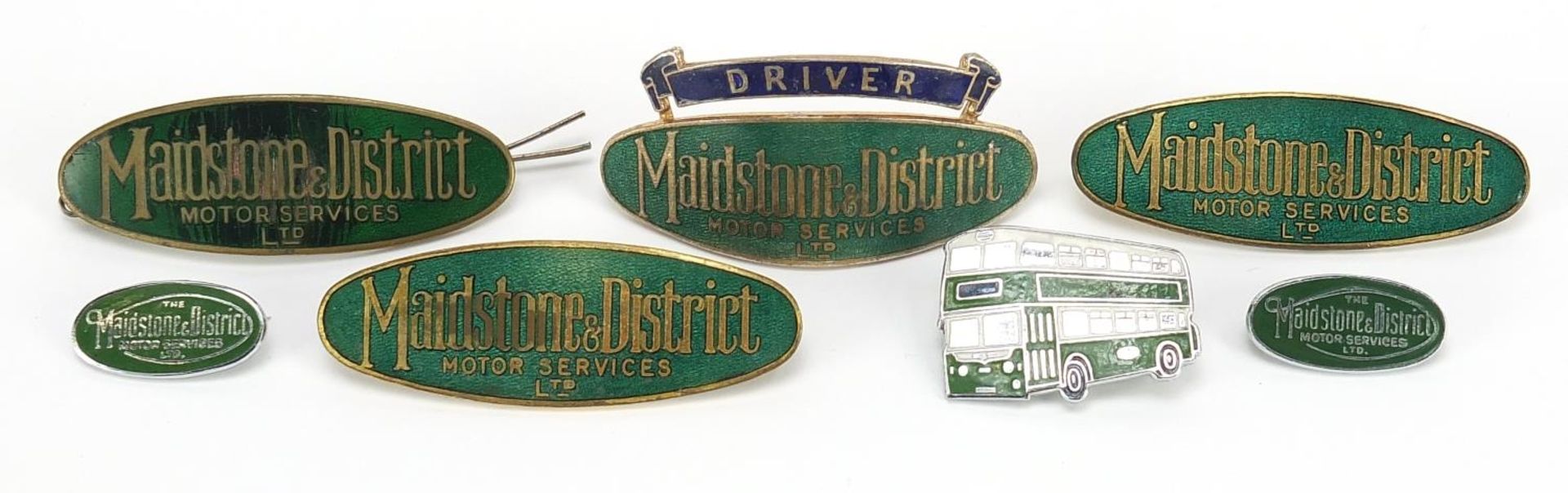 Vintage bus enamel badges including Maidstone & District Driver