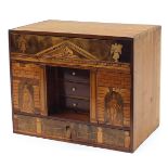 Antique and later continental wooden table chest with secret drawers inlaid with mythical figures,