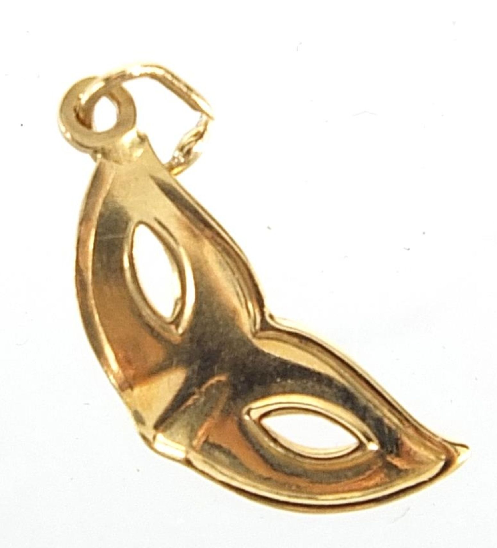 9ct gold masquerade mask charm, 1.7cm in length, 0.4g