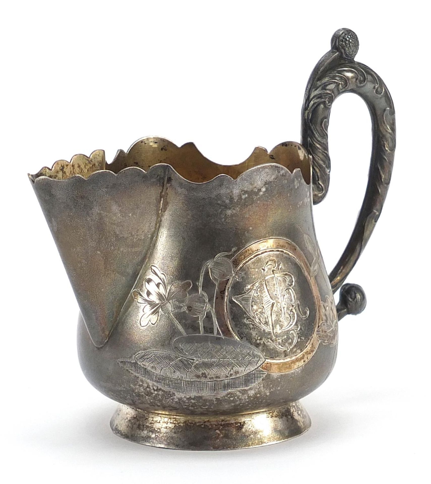 Russian silver jug engraved with flowers, impressed marks to the base, 10cm high, 101.0g