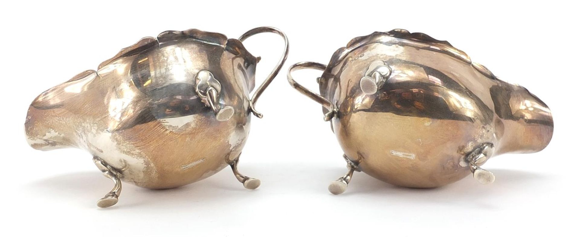 Mappin & Webb, pair of George V silver three footed sauce boats, 15cm in length, 169.0g - Image 4 of 4
