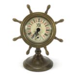 Patinated bronze ship's wheel design clock with subsidiary dial, 15.5cm high