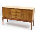 Gordon Russell sideboard with two cupboard doors and three central drawers, 86cm H x 141cm W x