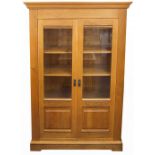 Large contemporary light oak two door bookcase, 199cm H x 151cm W x 50cm D