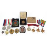 British militaria including World War II medals and cap badges