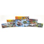 Five Lego sets including World Racers 8863, Speed Racer 8158 and Avian Conquest 7050