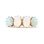 15ct gold cabochon opal four stone ring, size J, 2.0g