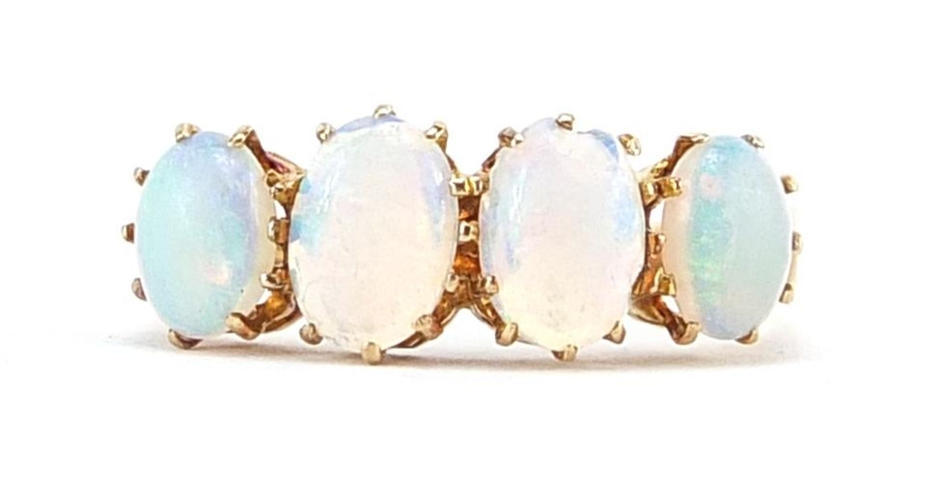 15ct gold cabochon opal four stone ring, size J, 2.0g