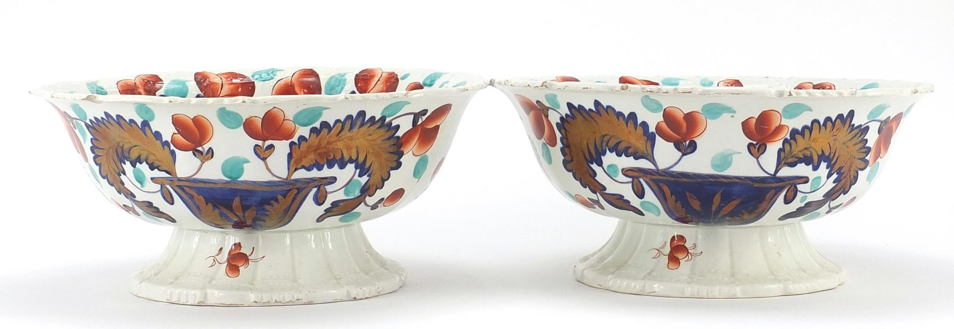 Pair of Victorian ironstone centre bowls decorated with flowers and foliage, each 29cm in diameter - Image 2 of 4