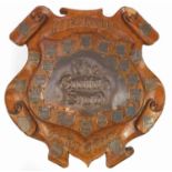 Large Arts & Craft oak shield carved Perseverando Fortiter et Recte, the copper plaques embossed The