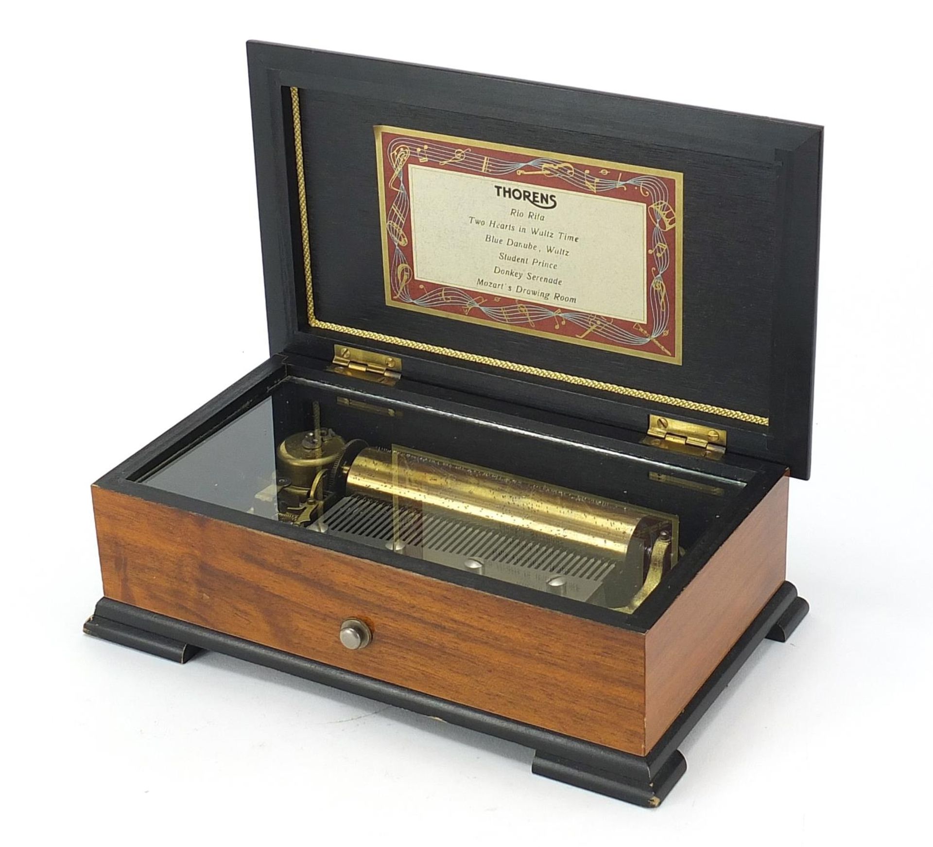 Thorens Swiss music box housed in an inlaid wooden case, 8cm H x 22.5cm W x 13cm D