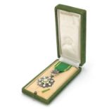 Arabian green and white enamel medal with box