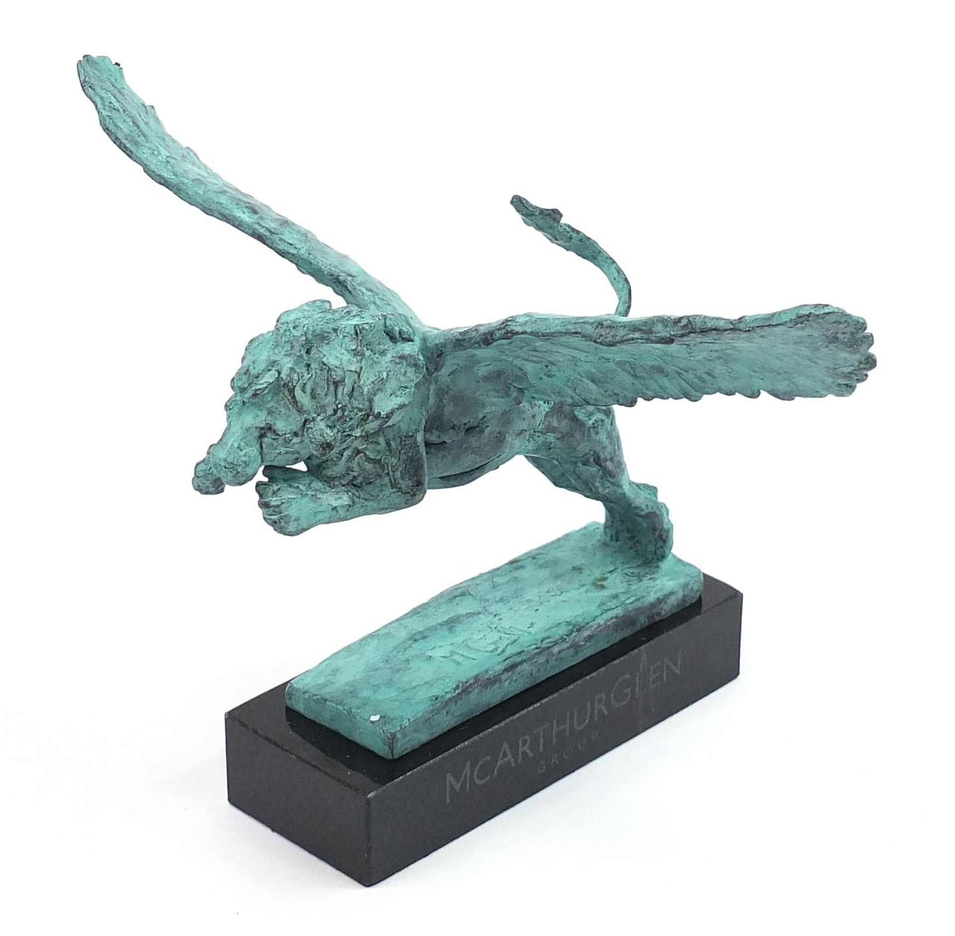 Mark Coreth for McArthur Glen Group, verdigris bronze study of a winged lion raised on a rectangular - Image 2 of 5