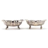 Victoria Silverware Ltd, pair of silver dishes raised on four paw feet, Birmingham 1999, 11cm