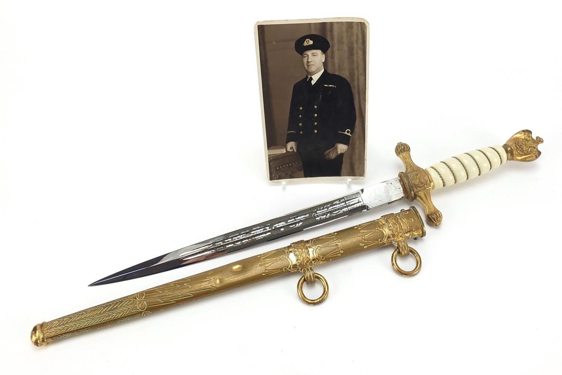 German military World War II Naval dirk with scabbard and engraved steel blade by Carl Eichkhorn