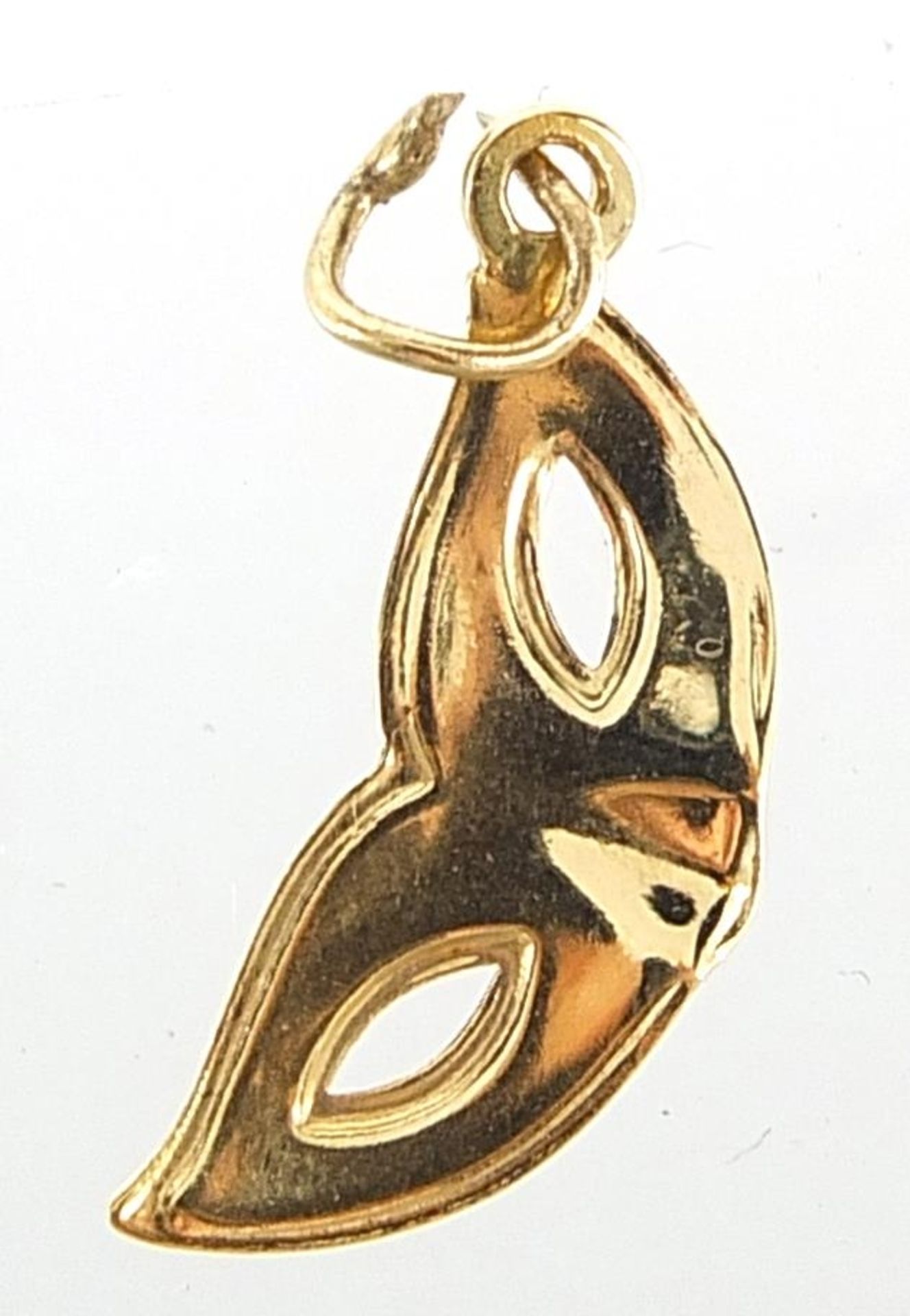 9ct gold masquerade mask charm, 1.7cm in length, 0.4g - Image 2 of 2