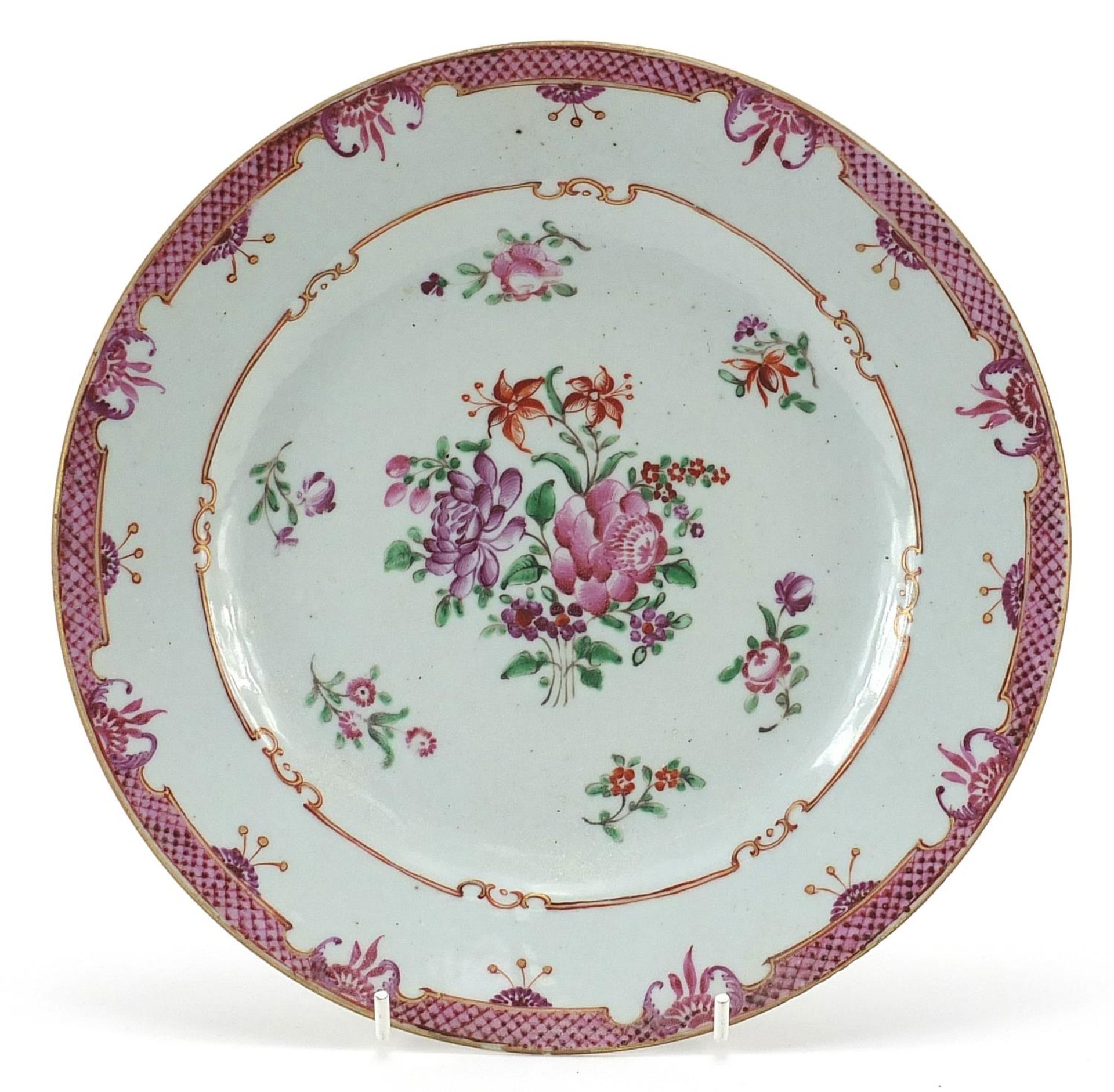 Chinese porcelain plate hand painted in the famille rose palette with flowers, 23cm in diameter