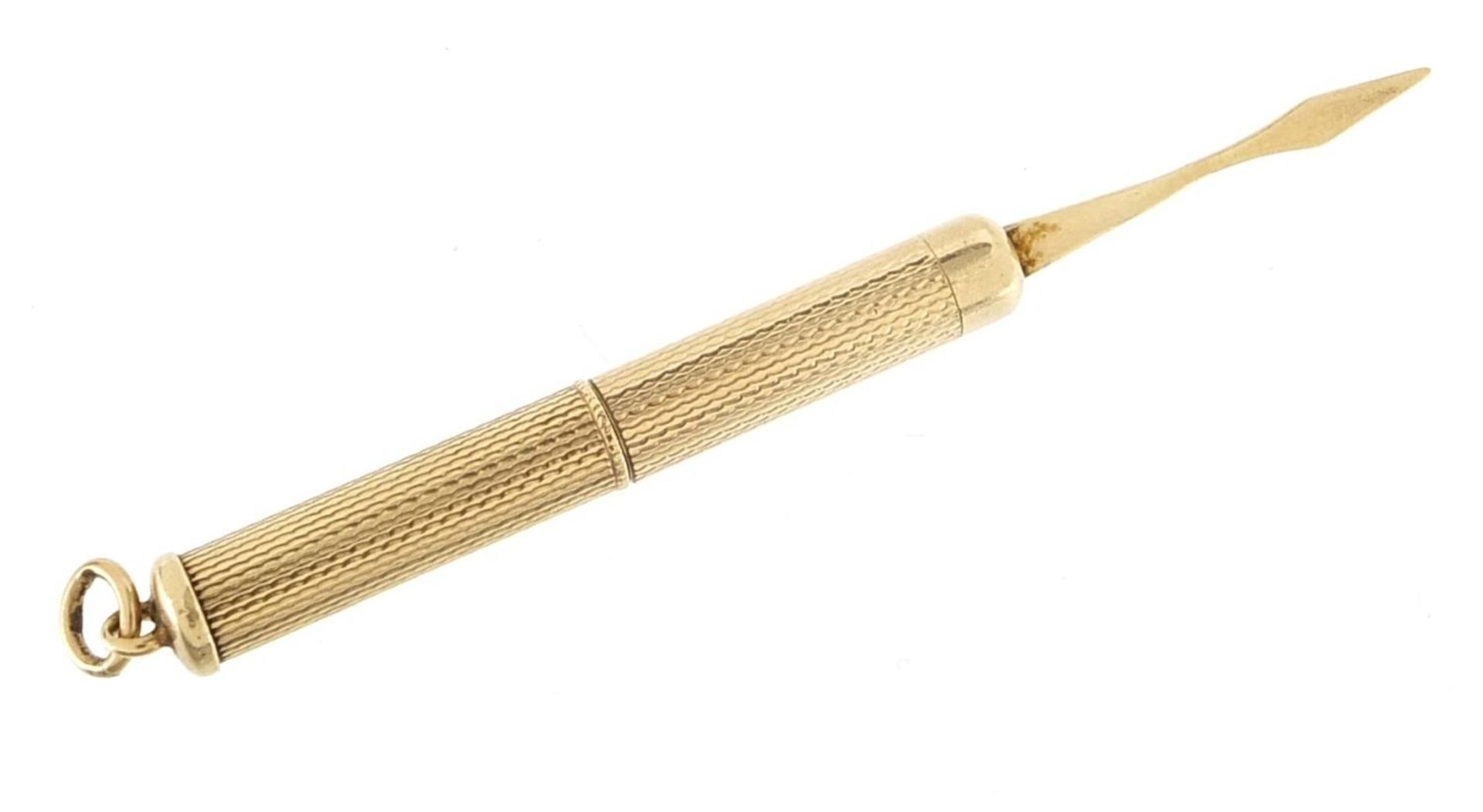 9ct gold propelling toothpick with engine turned decoration, 5.0cm in length un-extended, 6.6g - Image 2 of 3