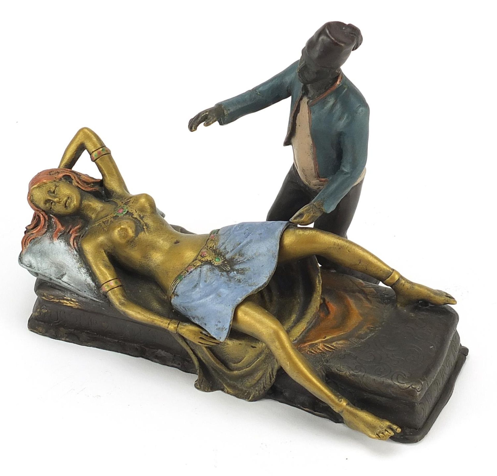 Cold painted bronze figure of an Arab and nude female in the style of Franz Xaver Bergmann, 18cm