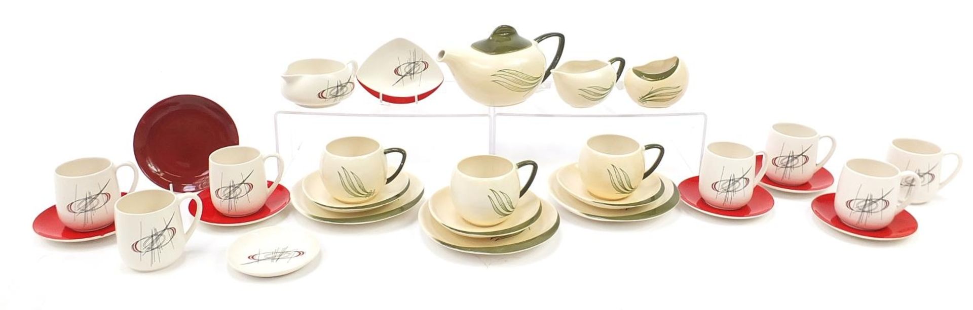 Carlton Ware Windswept part tea service and Orbit cups and saucers, the teapot 21cm in length