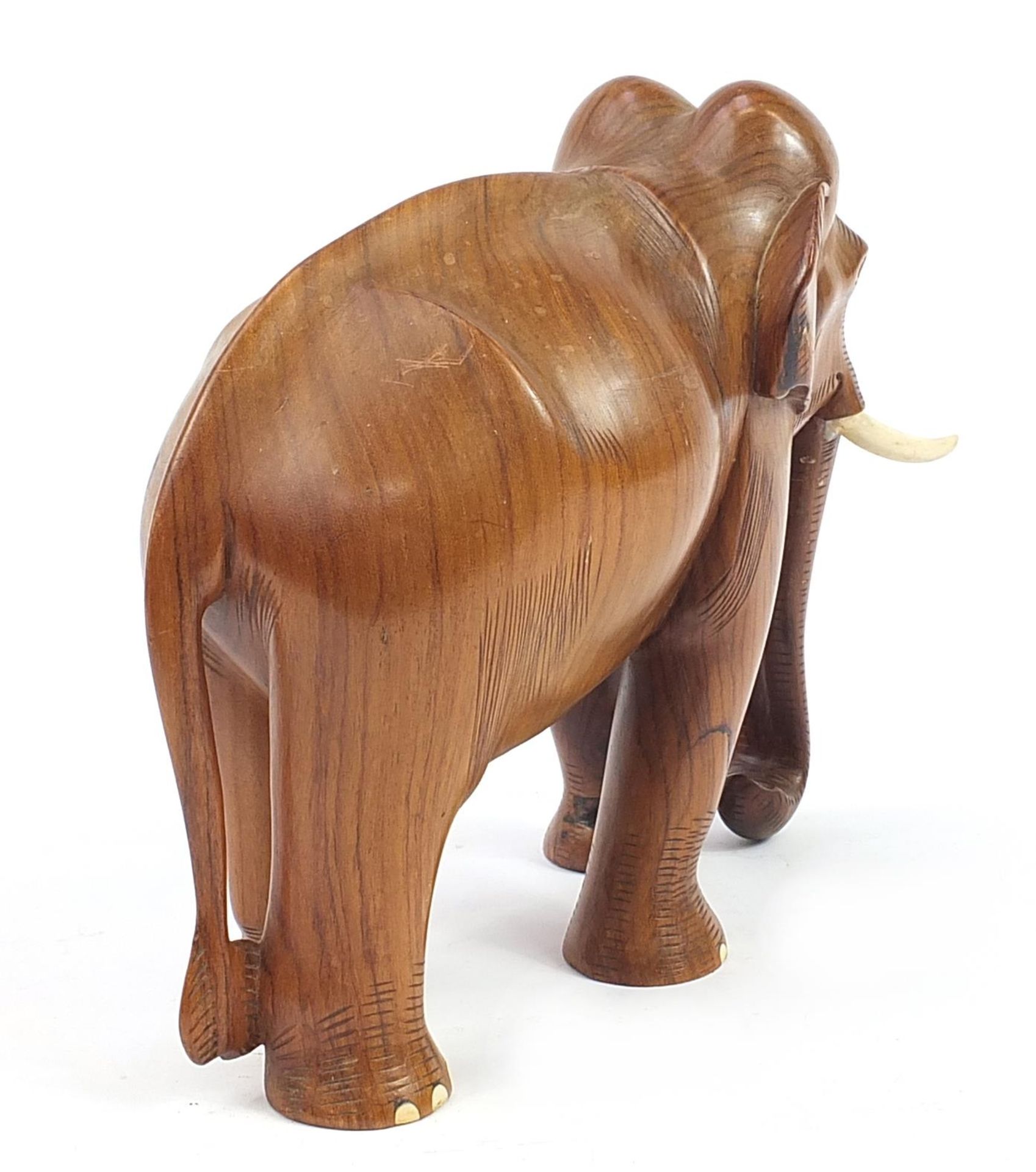 Large African hardwood carving of an elephant, 39cm in length - Image 2 of 3