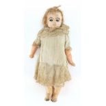 Antique composite doll with jointed limbs, 40cm high