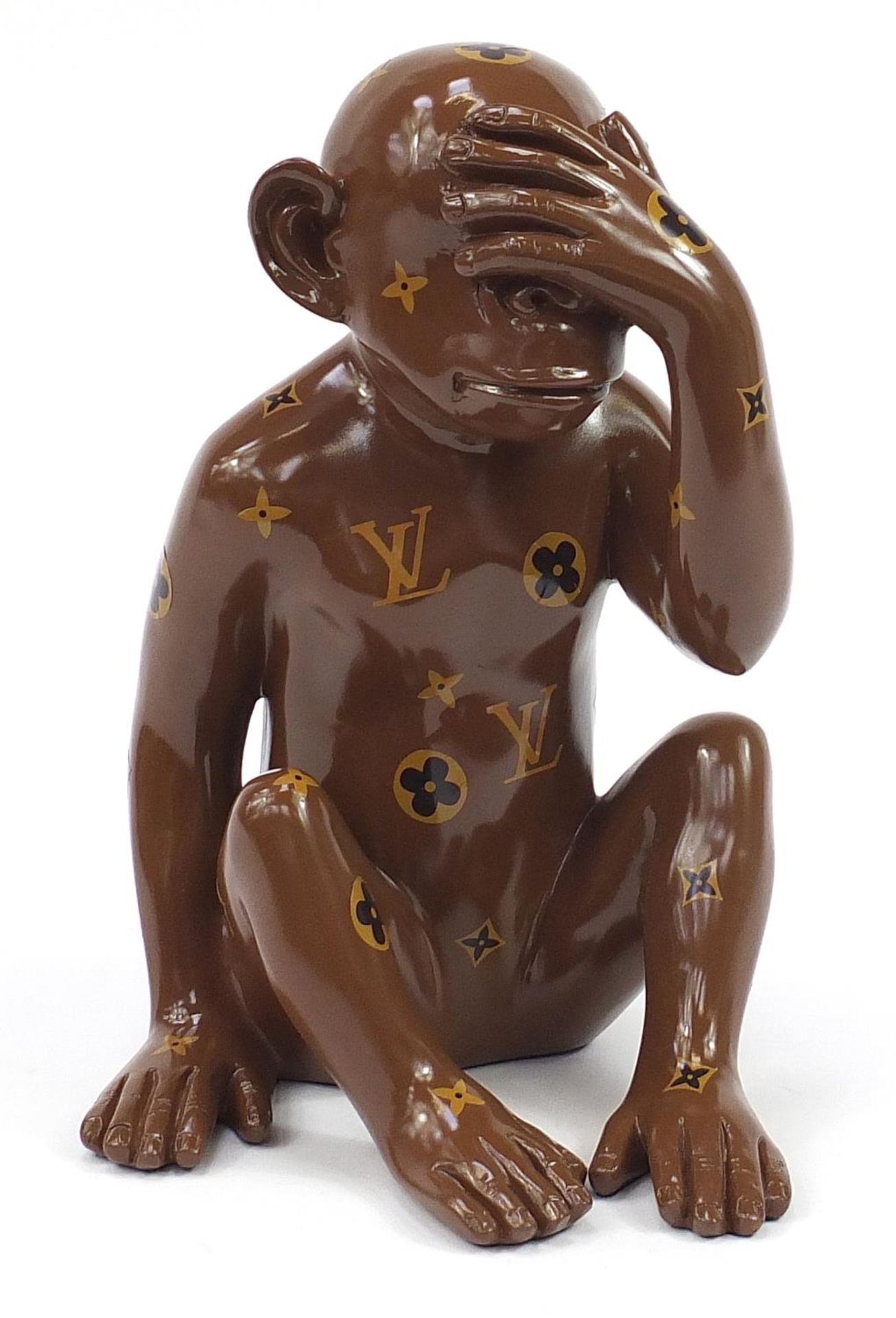 Louis Vuitton style seated chimpanzee, 39cm high