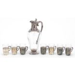 Gallia, French Art Nouveau silver plated and glass wine jug with seven cup holders with glasses, the