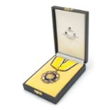 Military interest Order of the Crown of Brunei medal housed in a Spink & Son box