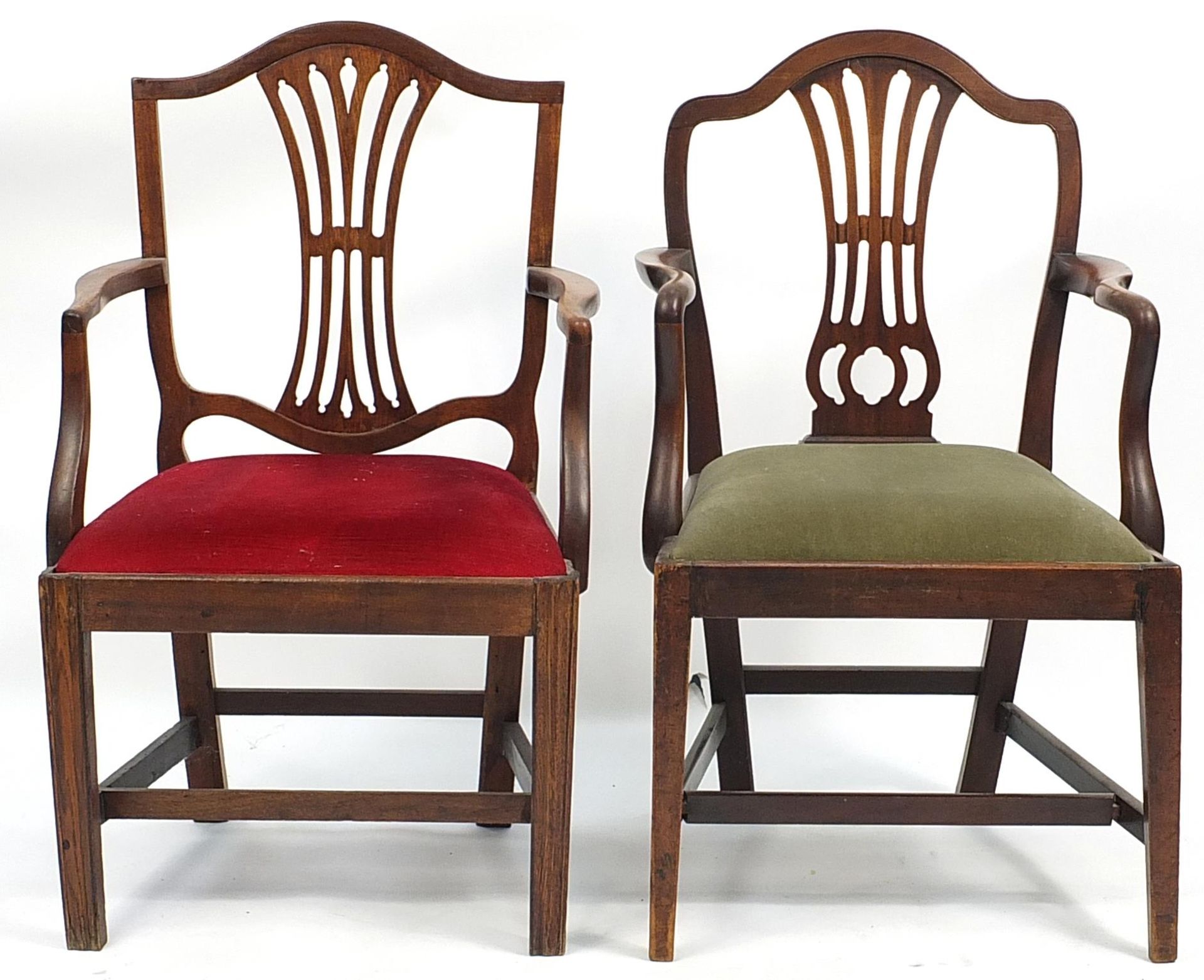 Two Victorian mahogany carver chairs with drop in seats, the largest 95cm high