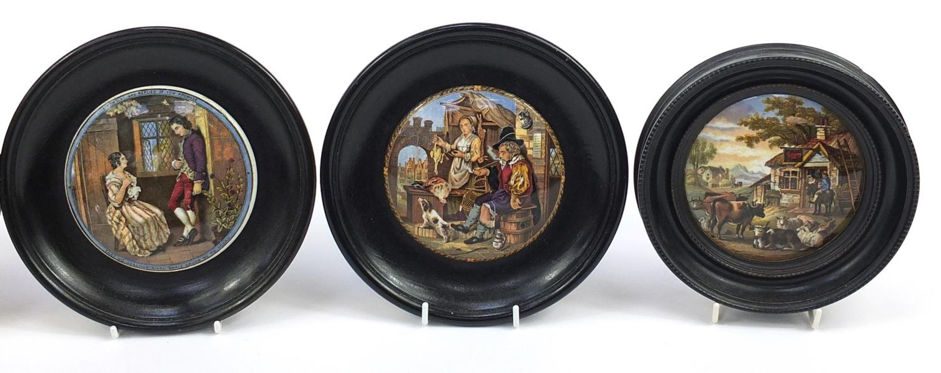 Six Victorian Staffordshire Prattware pot lids with ebonised wood frames, the largest 17cm in - Image 3 of 5