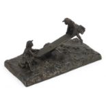 19th century bronzed metal letter clip in the form of two figures on a see-saw, 16.5cm wide