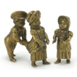 Victorian patinated bronze models of children playing, the largest 8.5cm in length