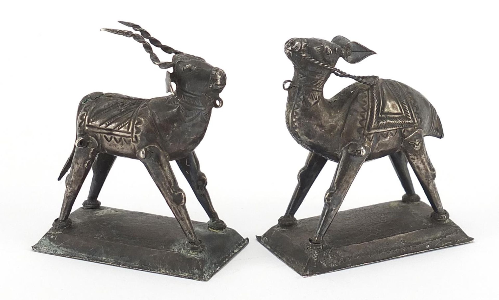 Pair of Indian silver coloured metal animals, the largest 6cm high, total 67.7g