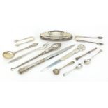 Silver objects including a Maltese letter opener, mustard spoons and sugar tongs, various hallmarks,