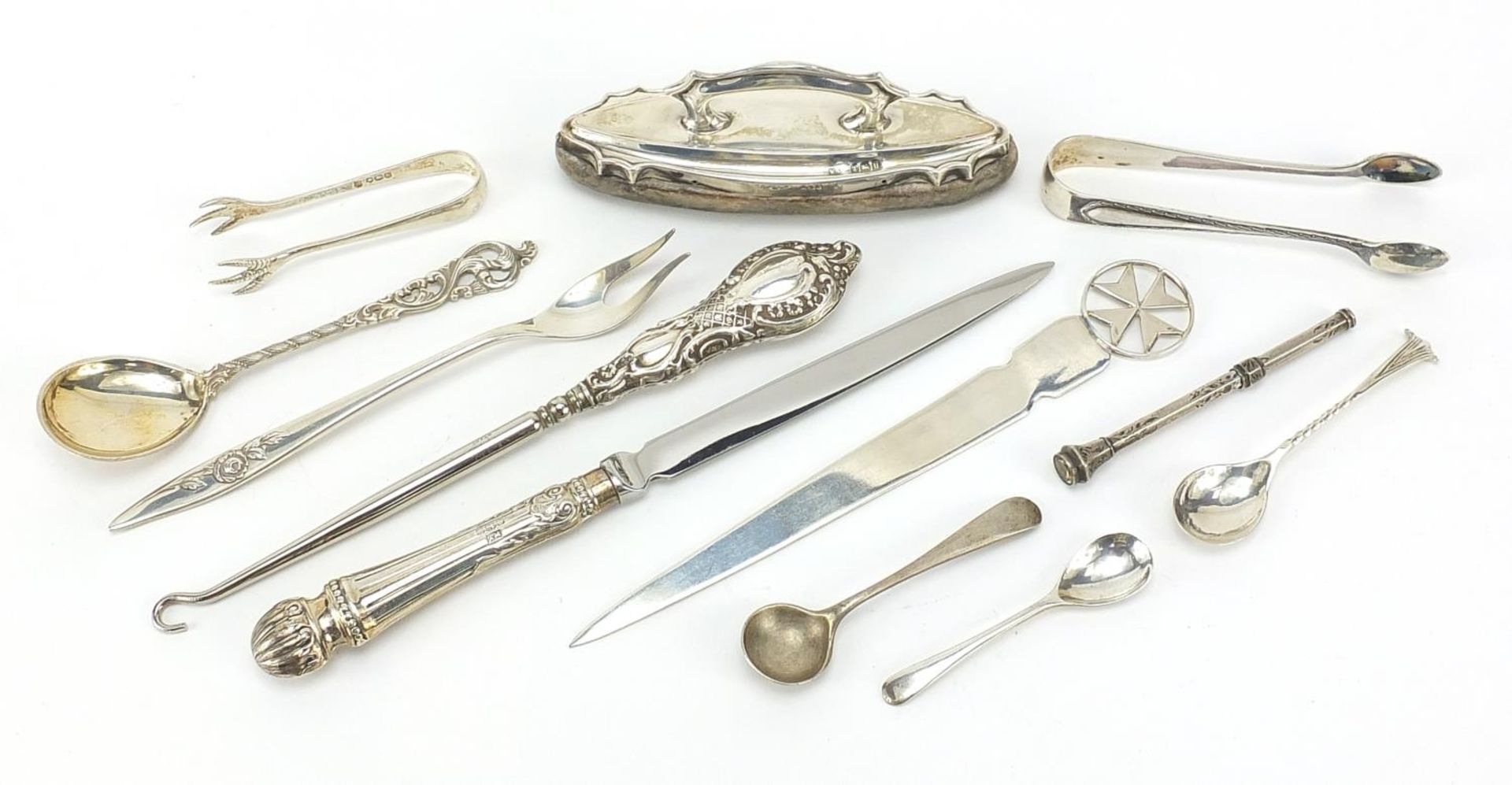 Silver objects including a Maltese letter opener, mustard spoons and sugar tongs, various hallmarks,