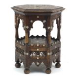 Manner of Liberty & Co, Moorish hexagonal occasional table with mother of pearl inlay, carved with