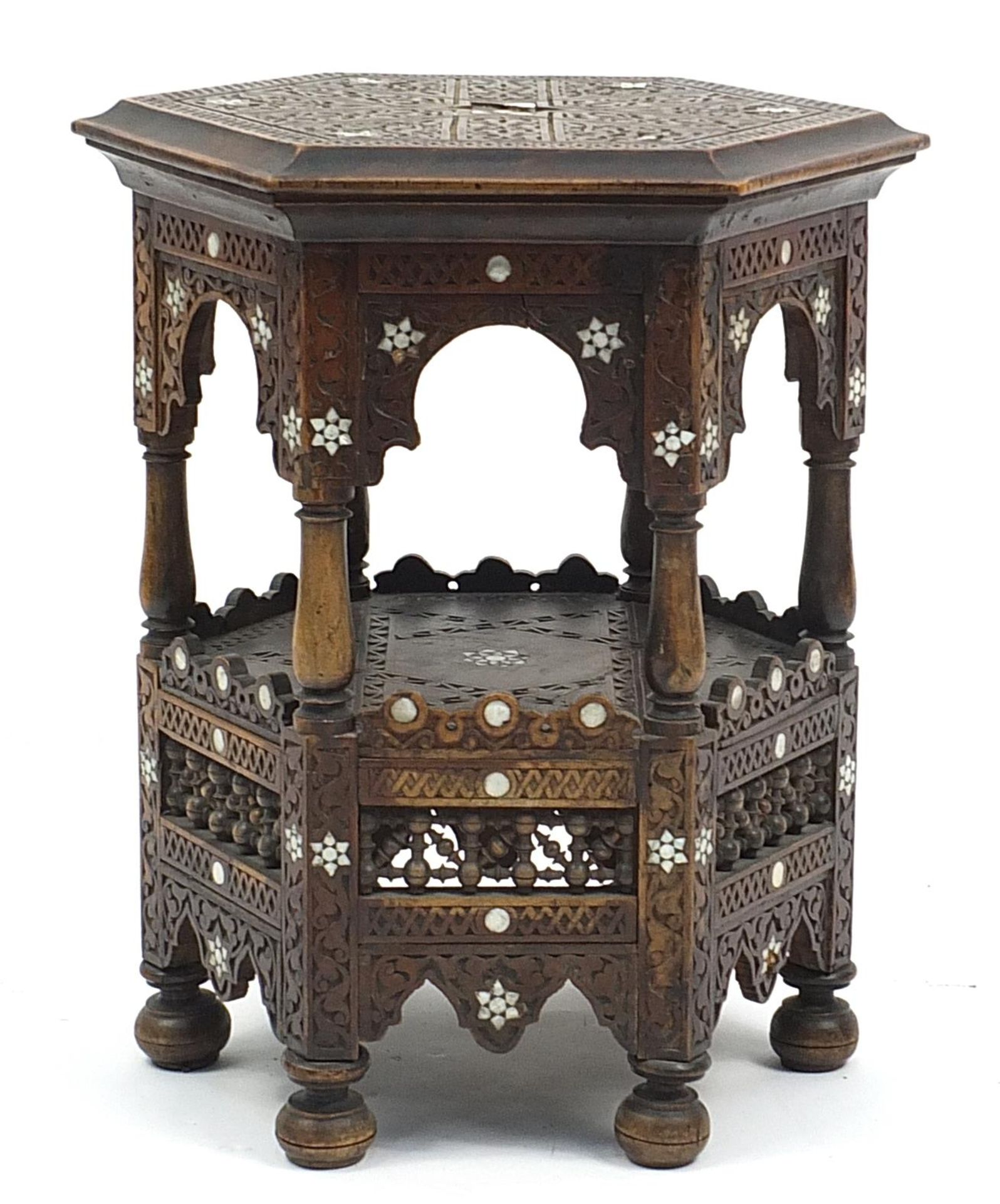 Manner of Liberty & Co, Moorish hexagonal occasional table with mother of pearl inlay, carved with