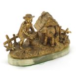 19th century gilt bronze inkwell in the form of a female feeding a dog in a kennel with hinged roof,