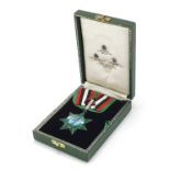 Arabian blue and green enamel medal housed in a Spink & Son box