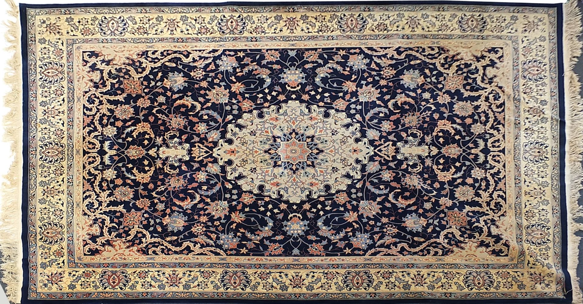 Rectangular Persian blue and cream ground carpet having an all over floral design, 360cm x 260cm