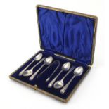 Henry Williamson Ltd, set of six Edwardian silver teaspoons and sugar tongs housed in a fitted case,