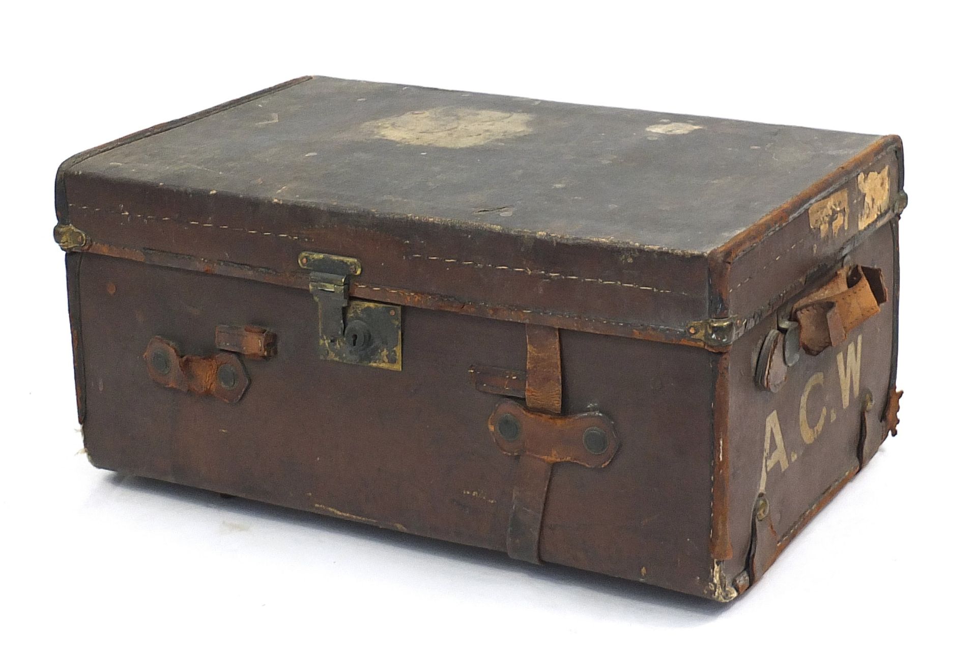 Drew & Sons, vintage brown leather trunk with remnants of shipping labels and initials A.C.W, 34.5c