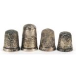 Four silver thimbles, the largest 2.5cm high, total 15.5g
