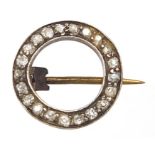 Unmarked gold diamond brooch, 1.6cm in diameter, 1.5g