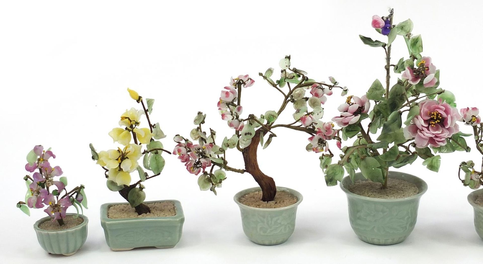 Seven Chinese hardstone bonsai trees with celadon glazed planters, the largest 28cm high - Image 2 of 3