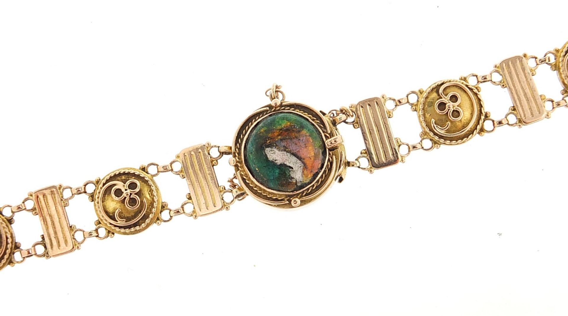Manner of Liberty & Co, Art Nouveau unmarked gold and enamel bracelet decorated with a female, tests