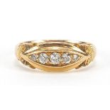 Edwardian 18ct gold diamond five stone ring with scrolled shoulders, Birmingham 1907, size M, 3.5g