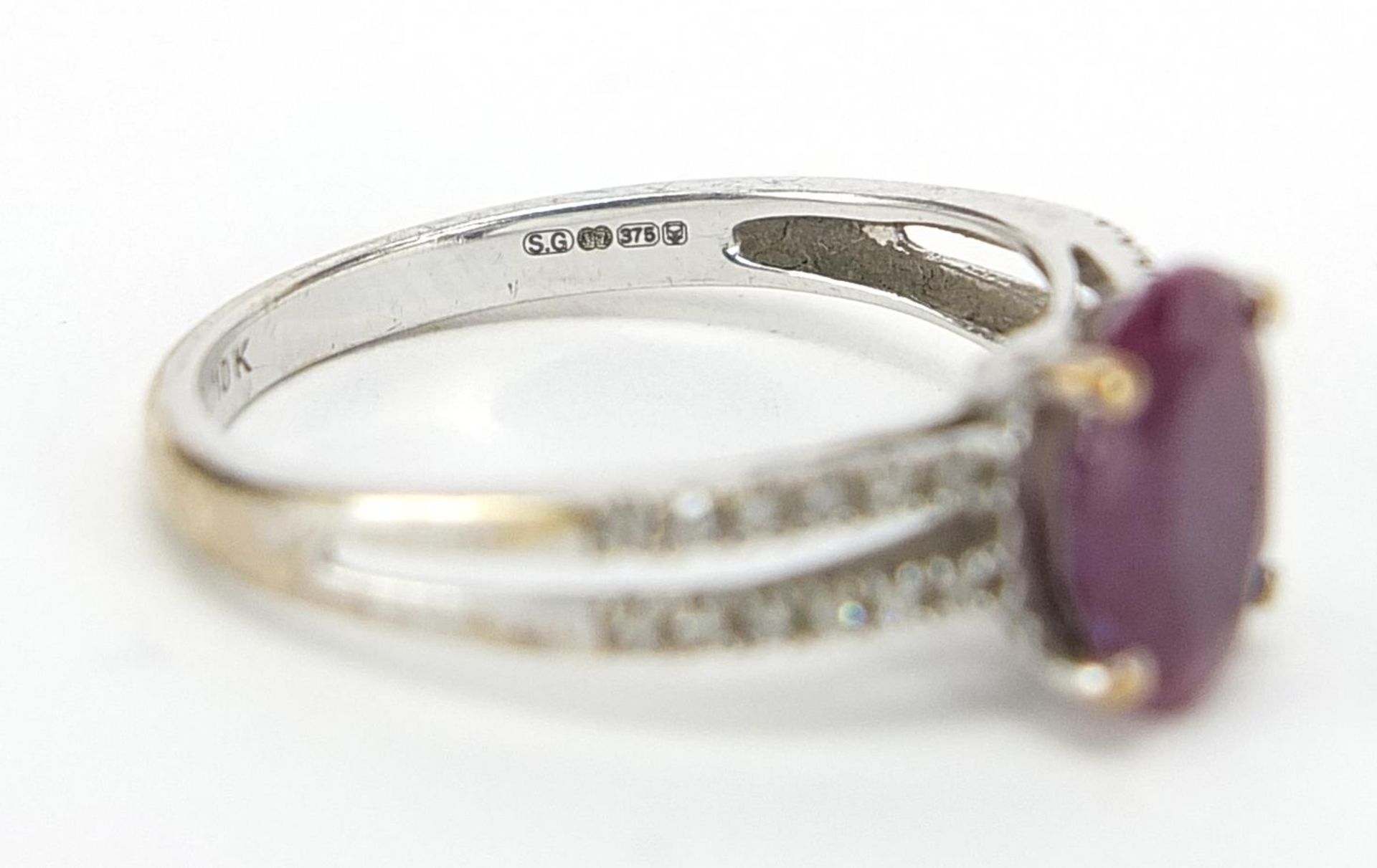 9ct white gold colour changing created Alexandrite ring with diamond set shoulders, stamped 0.10 to - Image 4 of 4