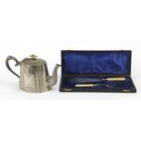 Silver plated teapot with ivory knop and pair of silver plated fish servers with ivorine handles
